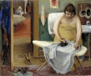 Девушка гладит белье