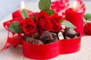 Розы и шоколадные конфеты