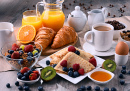 Breakfast Served With Coffee, Orange Juice, Croissants, Cereals and Fruits. Balanced Diet.